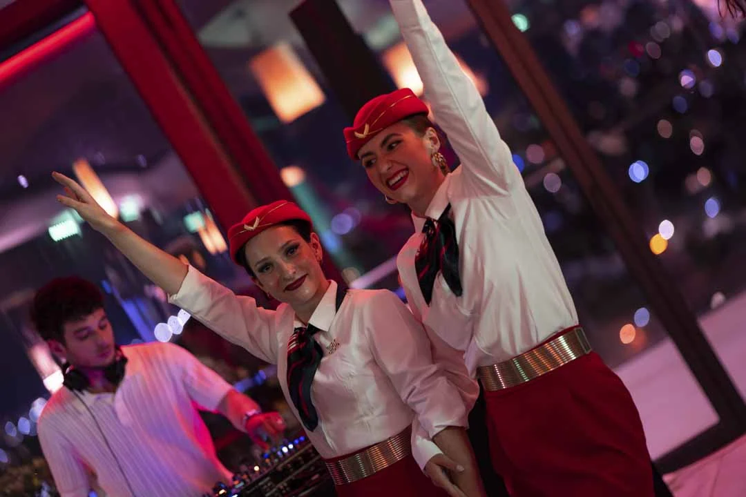 A bartender entertaining guests at the Altitude Malta evening