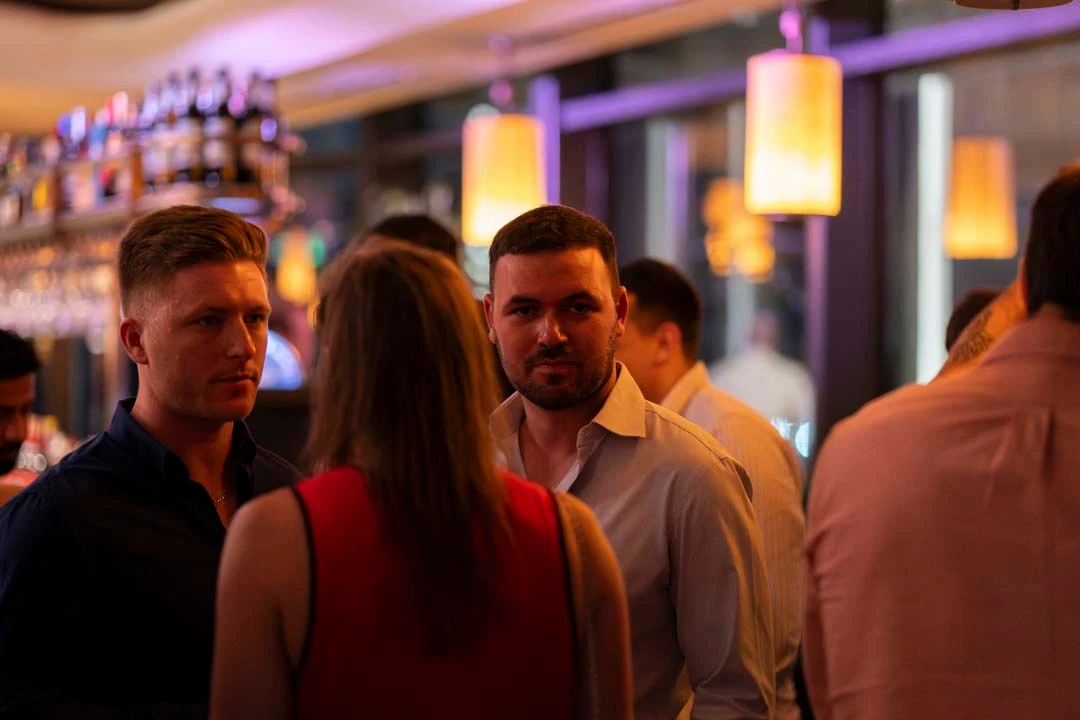 Guests in conversation at an Altitude evening in Malta