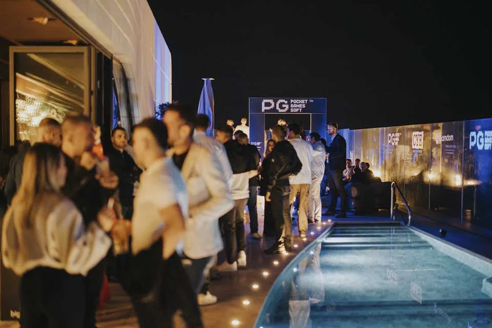 Guests beside the rooftop pool · Noyane · November 2024