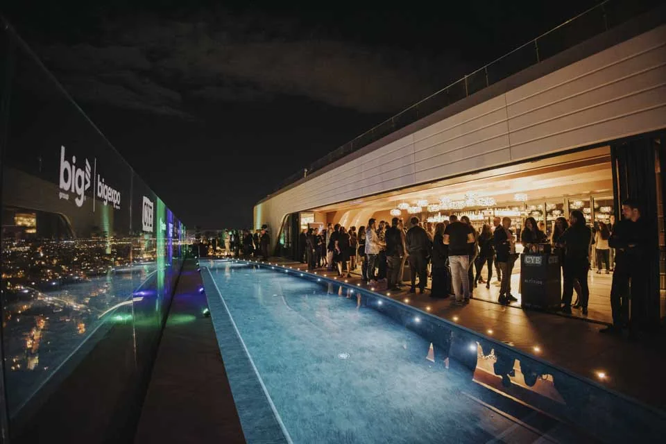 The evening gathering around the rooftop pool · Noyane · November 2024