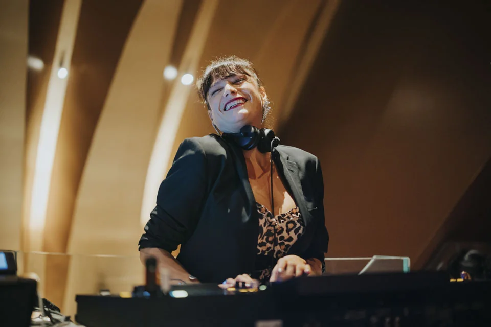 The DJ beneath the rooftop lights · Noyane · November 2024