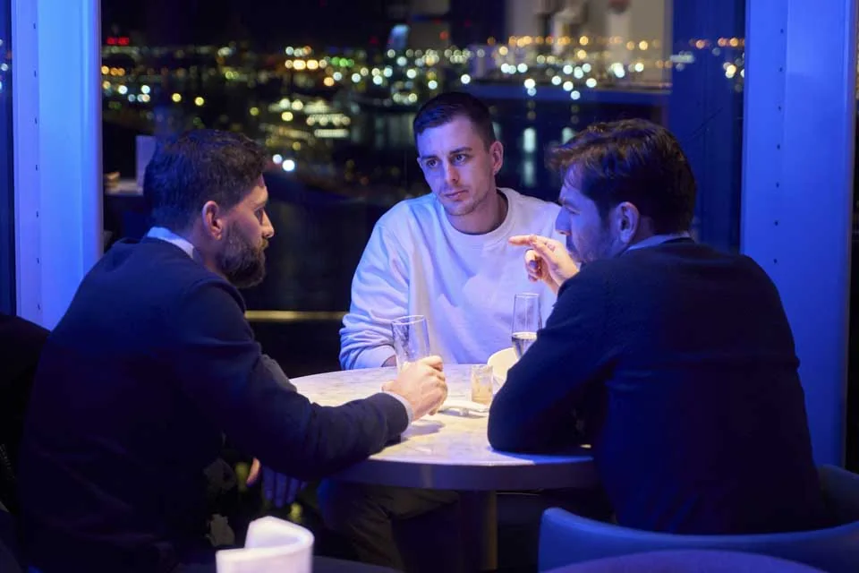 Guests connecting beside the Barcelona skyline · Noxe, Barcelona