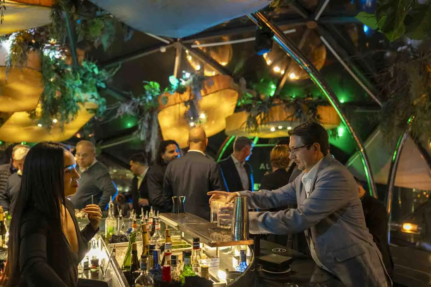 Guests gathered at the bar · Everything is possible