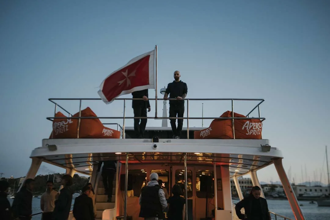The AFLOAT boat at dusk · AFLOAT — Exclusive Networking at Sea