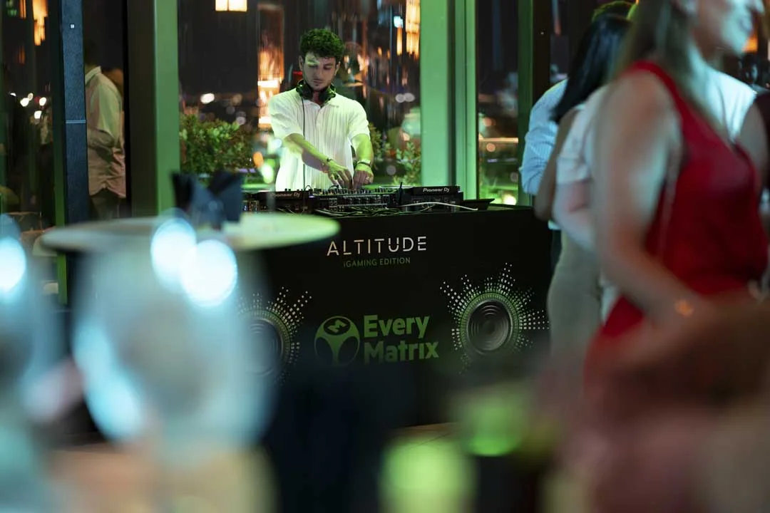 The DJ performing · Above the island