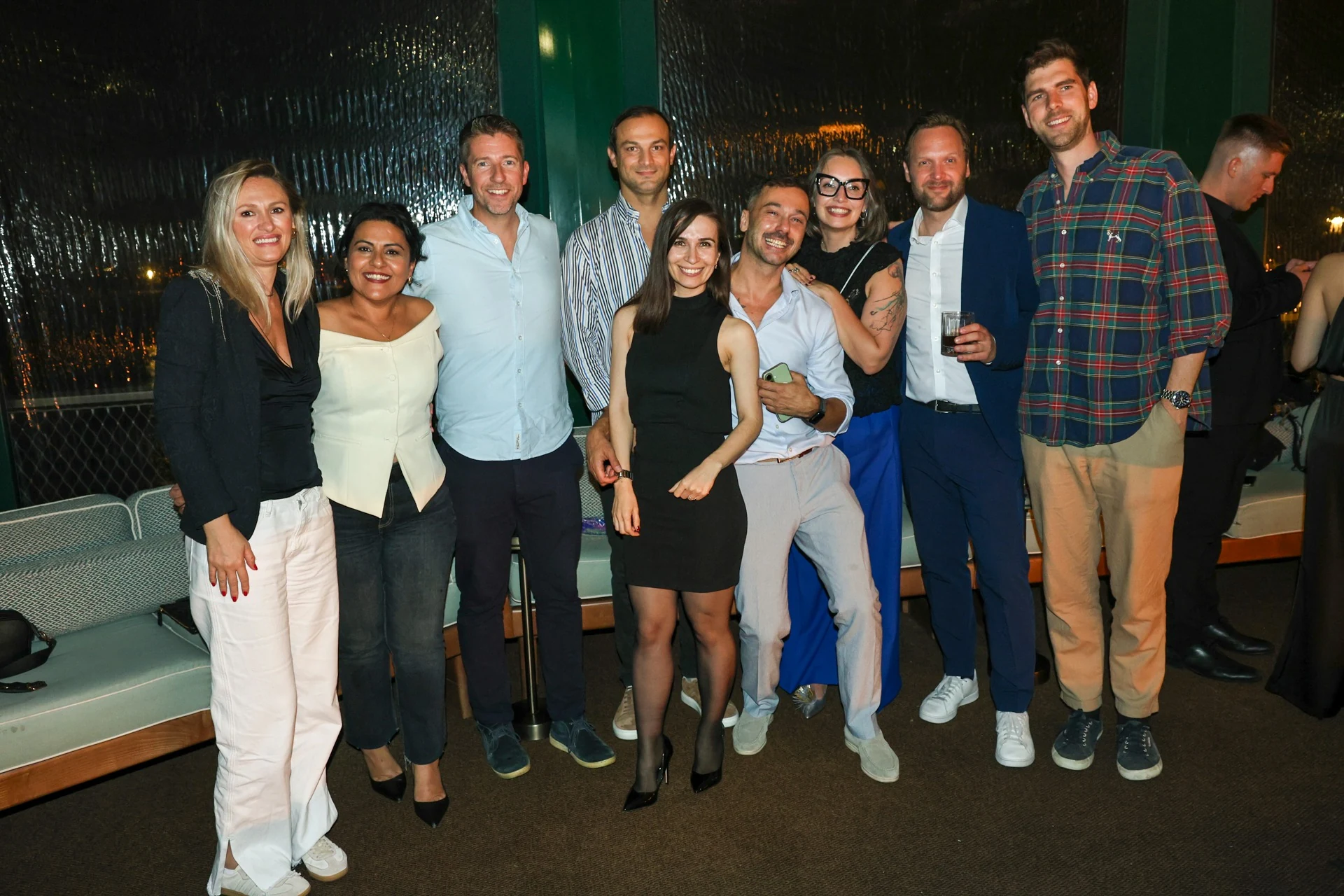 A group of guests posing together at Altitude Lisbon 2026.
